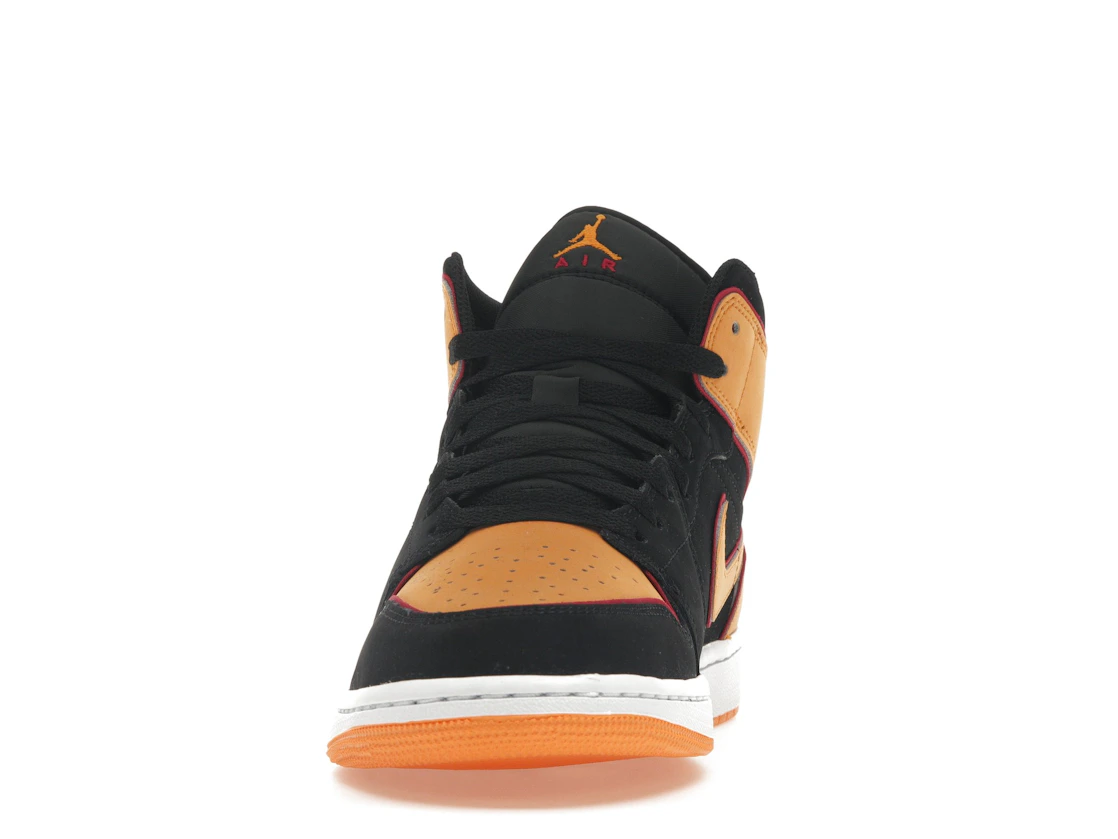 Vue 11 de Jordan 1 Mid Fat Tongue Black Orange