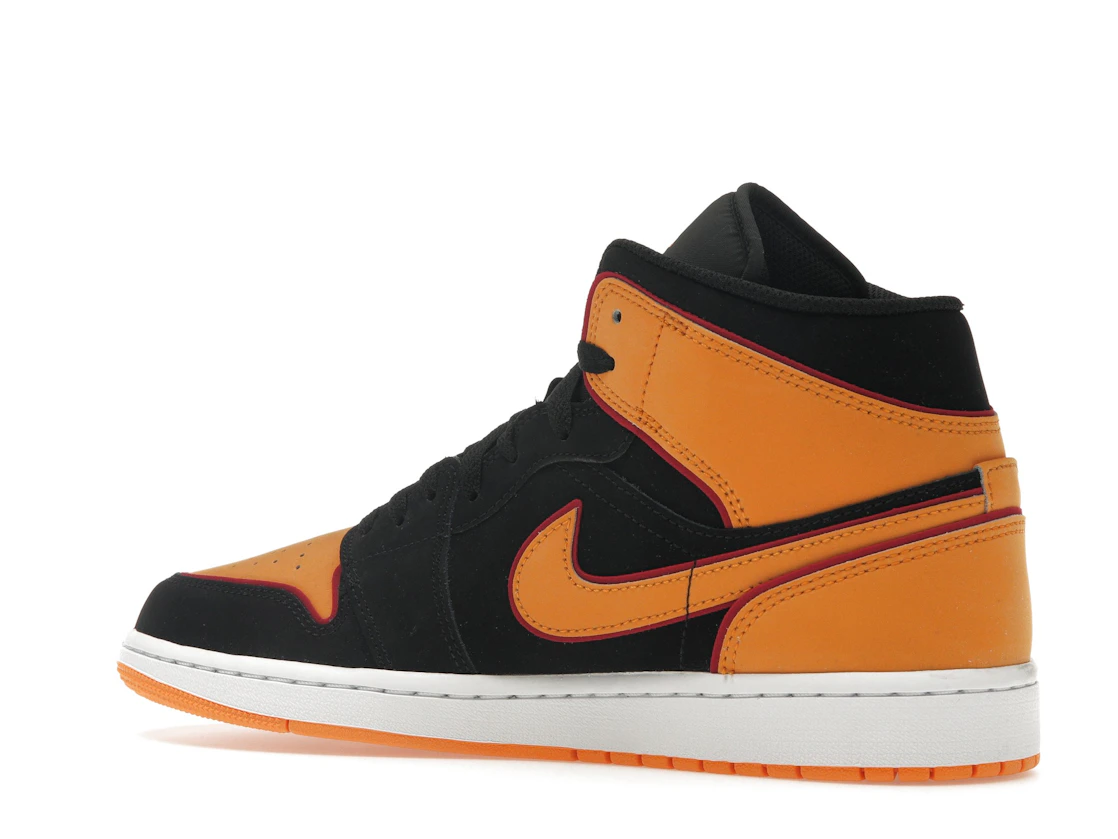 Vue 22 de Jordan 1 Mid Fat Tongue Black Orange